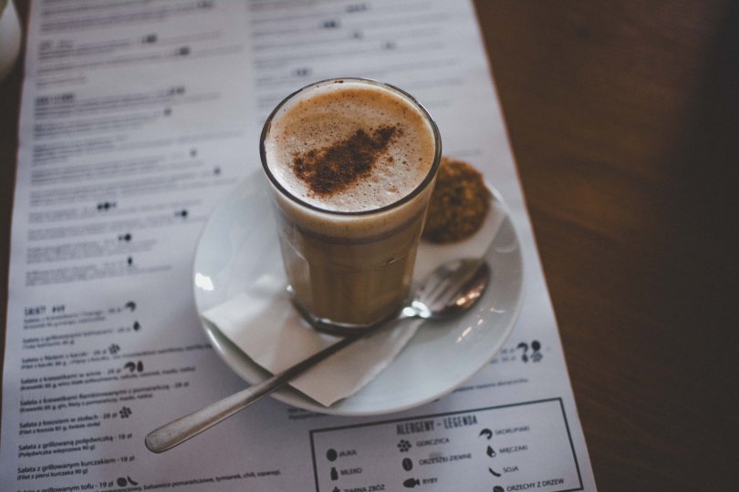 Photo of a cup of coffee sitting on a menu