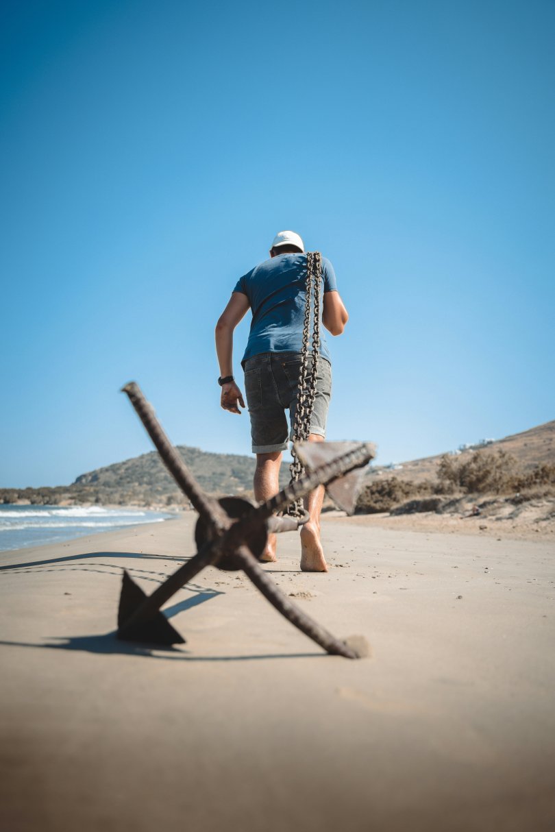 anchor pulled by a man