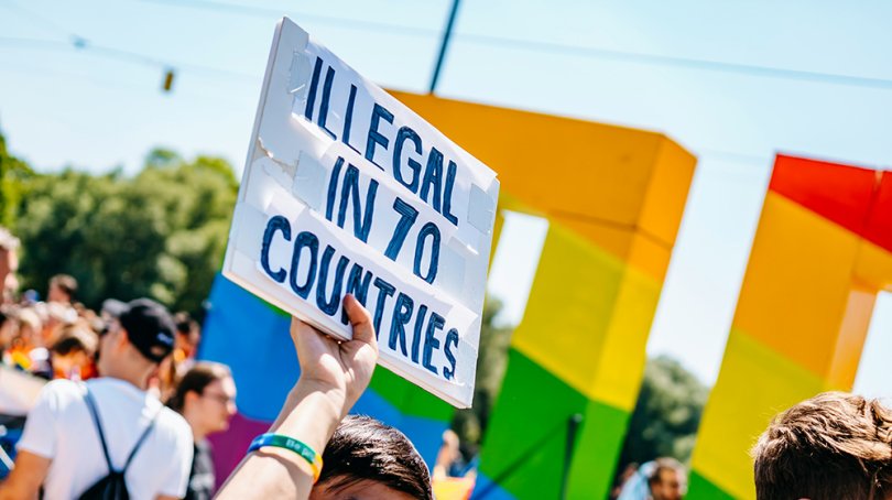 March in Munich, a sign reads ‘Illegal in 70 countries’